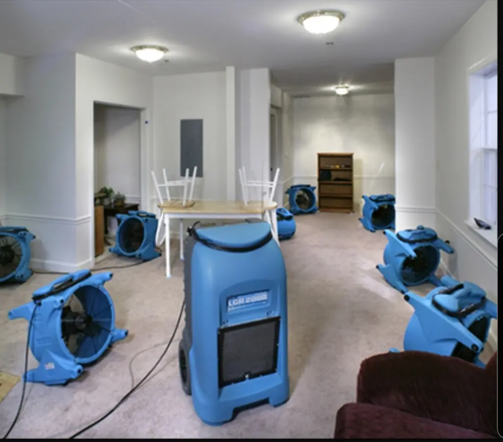 Air movers and dehumidifier setup for Water Damage Restoration in Gladstone